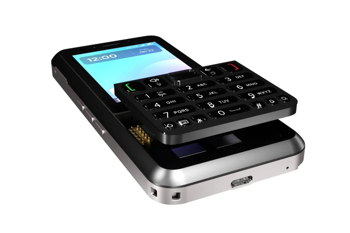Keyphone The Hybrid with its swappable keypad module lifted above the phone body