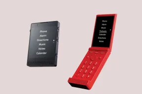 The black Light Phone III and an open red Light Flip, both showing a menu of Phone, Alarm, and Directions