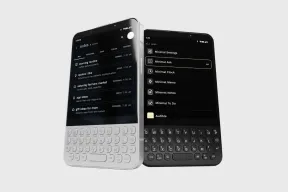 Minimal Phone 2 in white and black, each with a physical QWERTY keyboard under a dark text screen