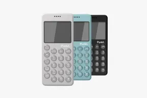 Three Punkt MP02 keypad phones in light gray, light blue, and black