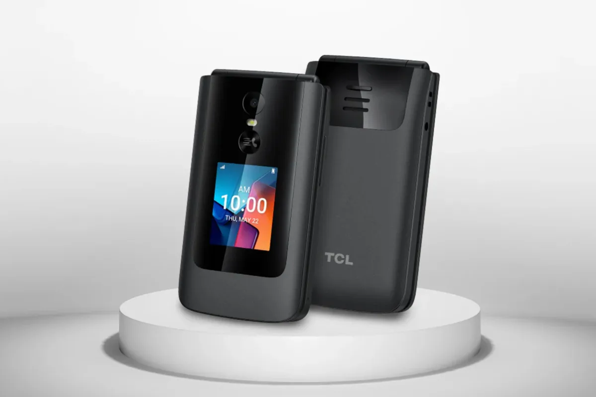 The TCL Flip 4 5G shown closed from the front and back on a white stand, with an outer display and a camera